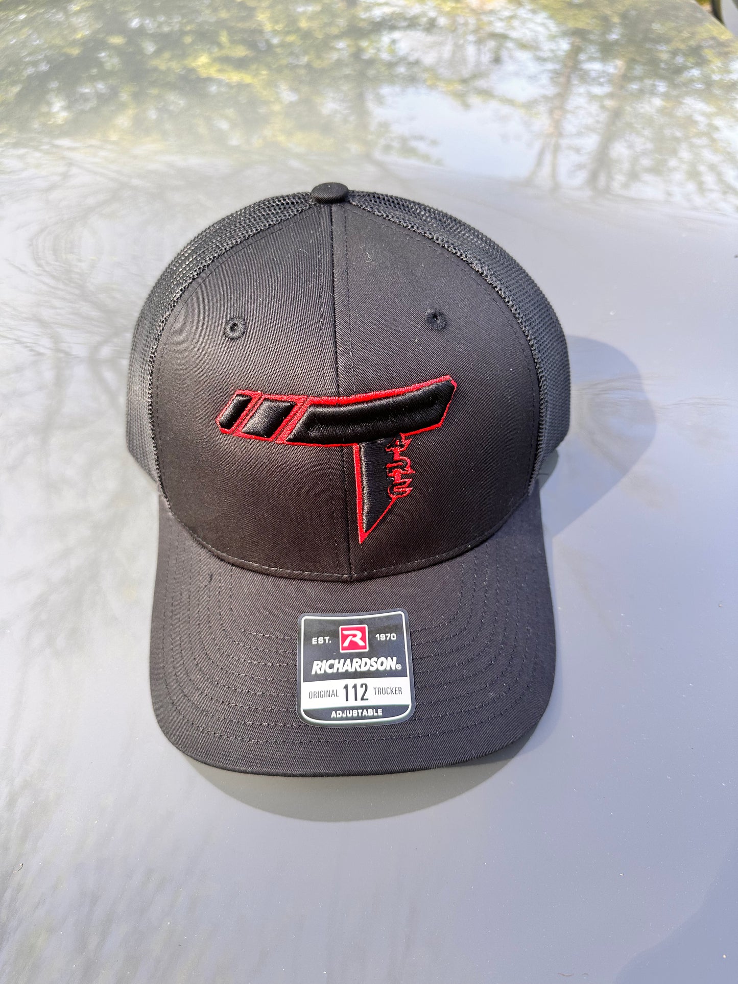 Red outline trucker hat
